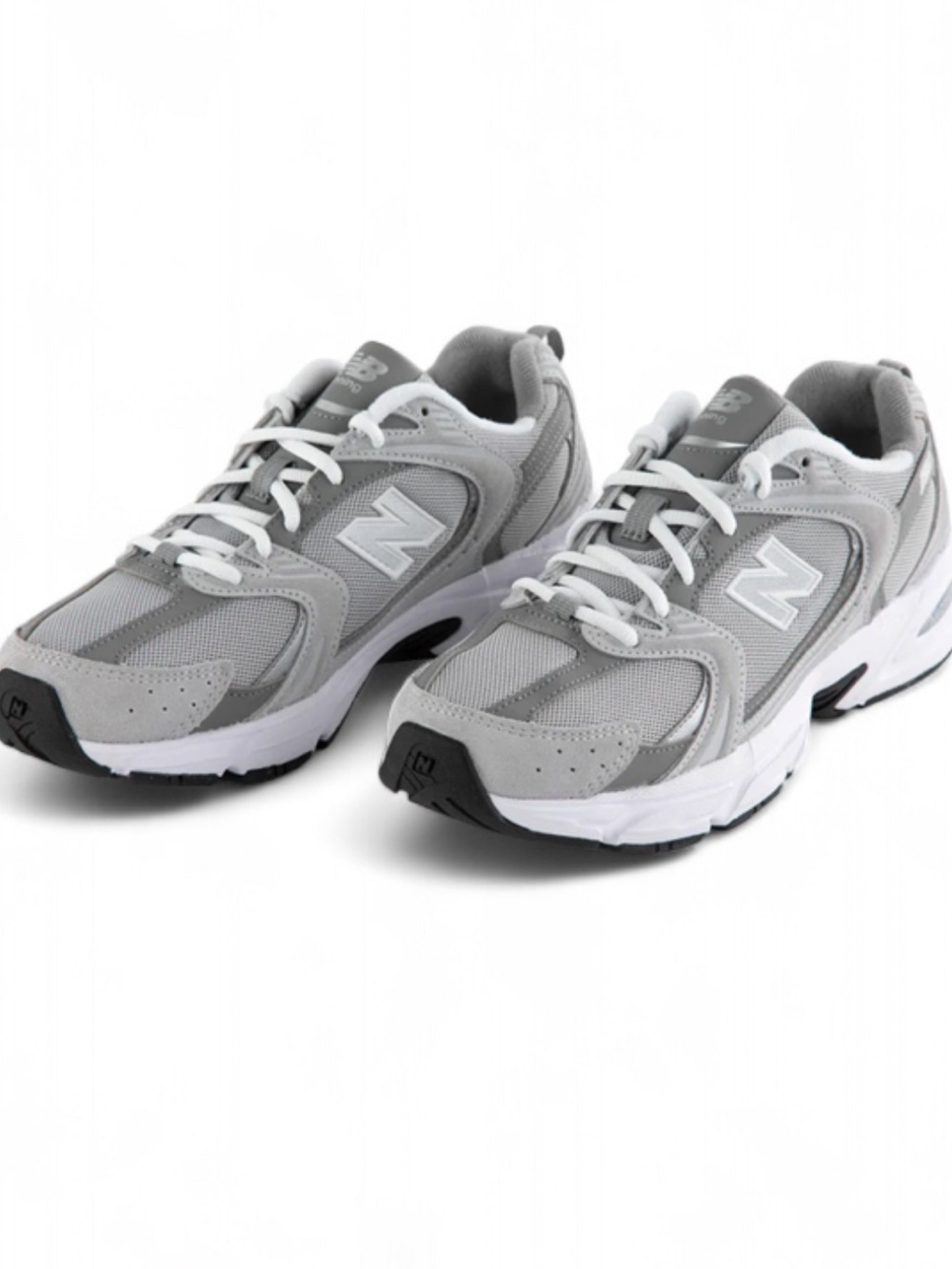 New Balance Woman’s Grey and White Athletic Sneakers